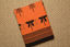 Picture of Orange and Black Block  Printed Malmal Cotton Saree