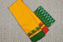 Picture of Yellow With Green and Red Mango Motifs and Zari Kaddi Ganga Jamuna Border Pure Kanchi Cotton saree