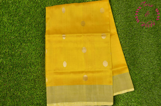 Picture of Yellow Uppada Silk Saree with Silver Butta and Border